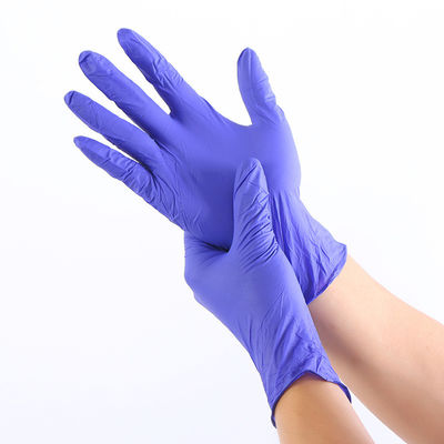 4 gants jetables bleus de nitriles du mil 5mil pour les mains en sueur