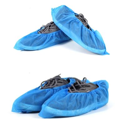 L'anti protecteur bleu en plastique de chaussure de glissement couvre non le glissement